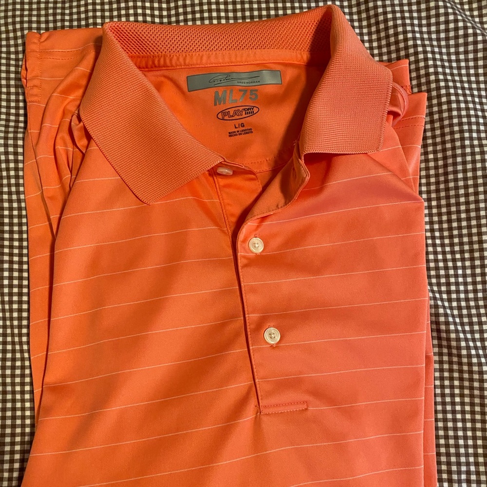 Salmon colored Greg Norman Polo